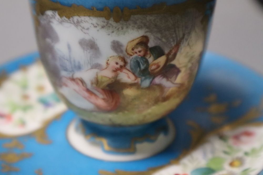 A Sevres coffee cup and saucer, a breakfast cup & saucer, coffee cup & saucer and a coffee cup